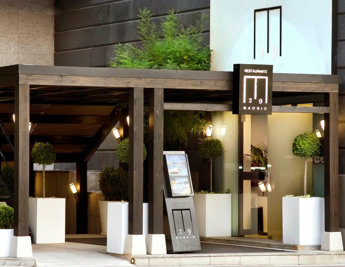 Hotel Miguel Angel Madrid Kültér fotó Entrance of the hotel
