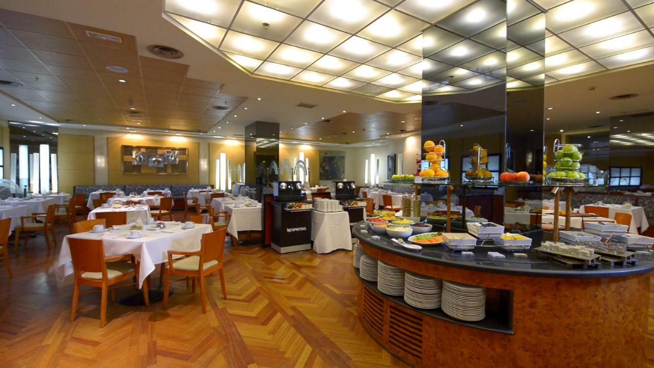 Hotel Miguel Angel Madrid Kültér fotó The restaurant